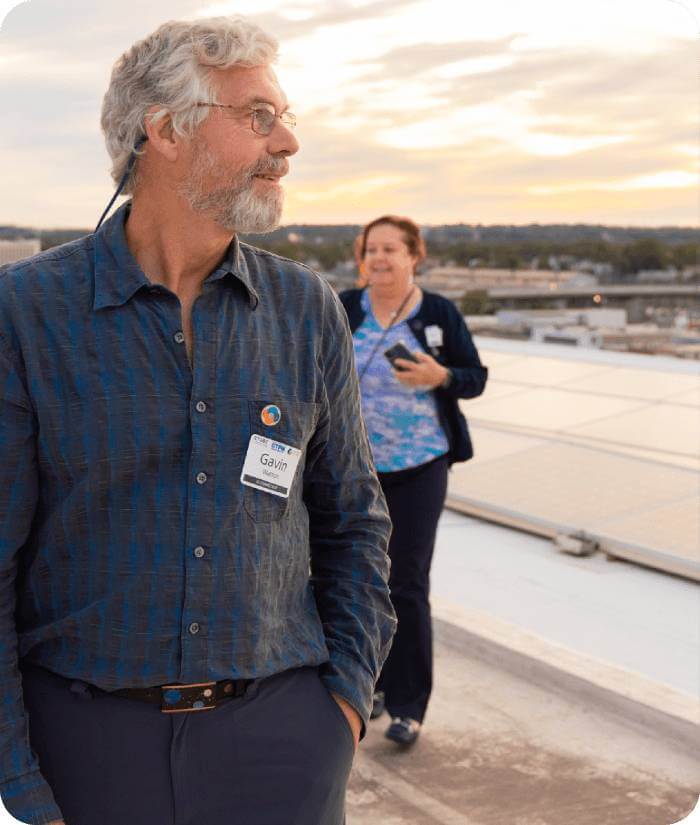 gavin-watson-and-associates-gavin-watson-on-solar-paneled-roof-image